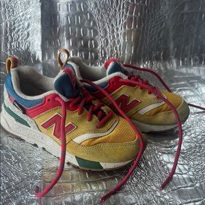 New Balance Kids Yellow Sneakers with Red and Green Accents